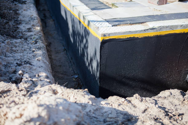 Professional Waterproofing technician working in Fredonia, WI